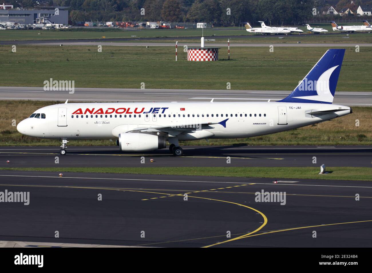 Turkish Anadolu Jet Airbus A320-200 with registration TC-JAI on taxiway at Dusseldorf Airport. Stock Photo
