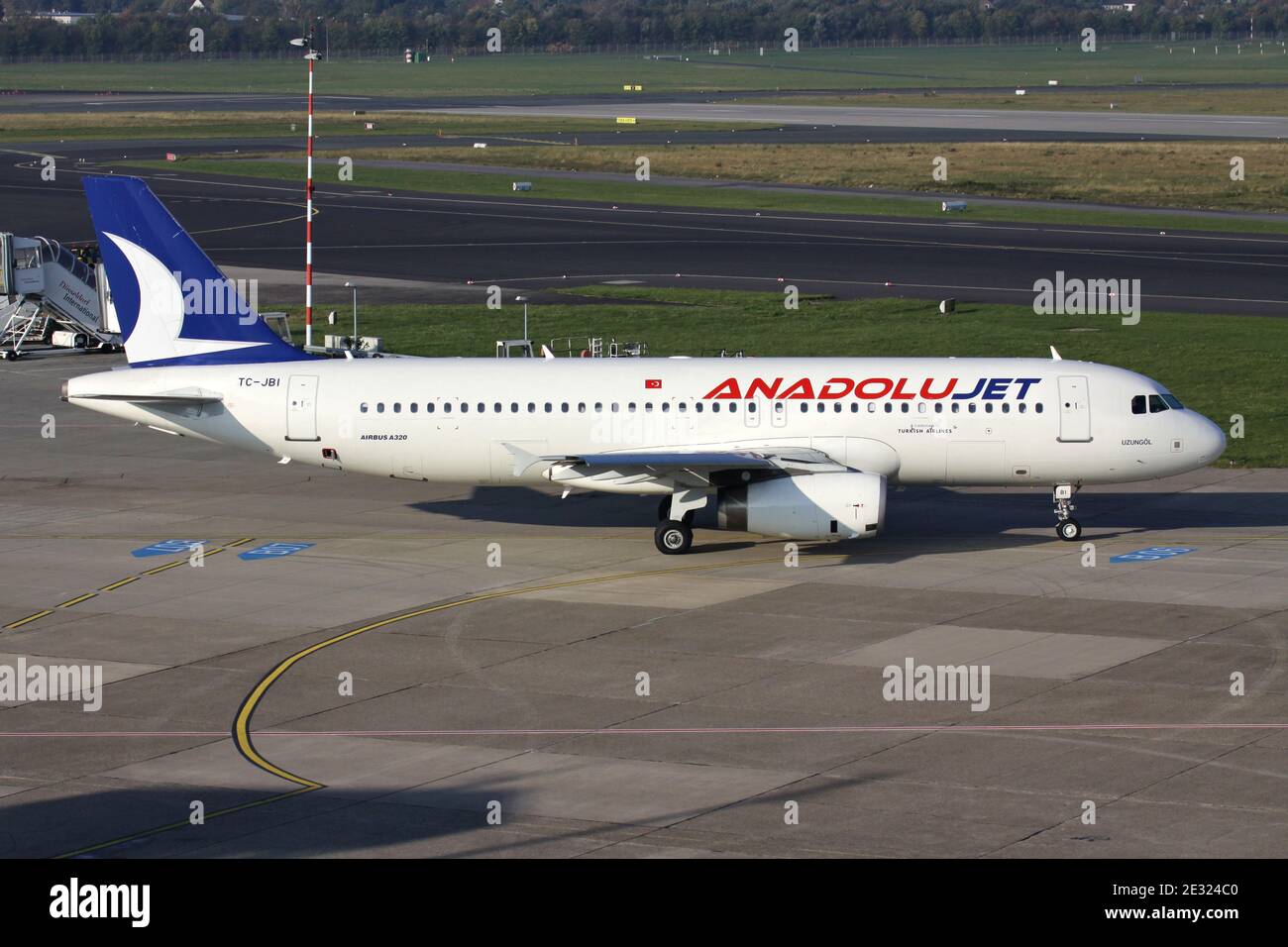 Turkish Anadolu Jet Airbus A320-200 with registration TC-JBI on taxiway at Dusseldorf Airport. Stock Photo