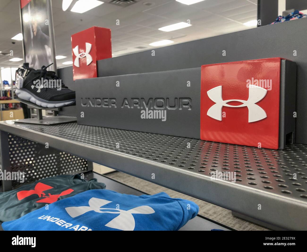 Indianapolis - Circa January 2021: Under Armour display. Under Armour manufactures a popular line of sporting equipment apparel. Stock Photo