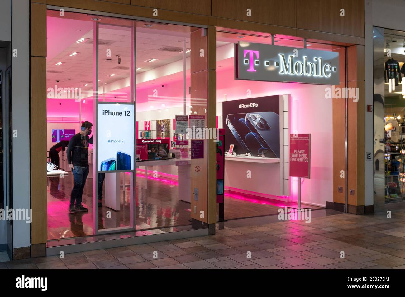 Indianapolis - Circa January 2021: T-Mobile Retail Wireless Store. T-Mobile merged with Sprint in hopes of advancing 5G development. Stock Photo