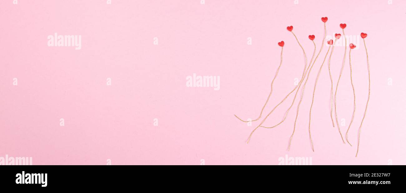 Valentine's day greeting card template. Pink background with small red ...