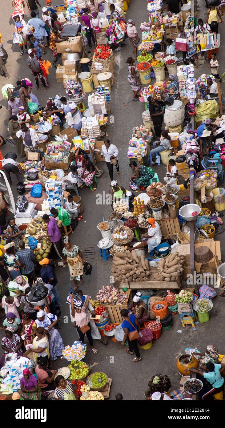Makola crowded street market overhead Ghana Africa. Historical busy congested downtown, Accra. Historic place to buy and sell products, poverty. Stock Photo