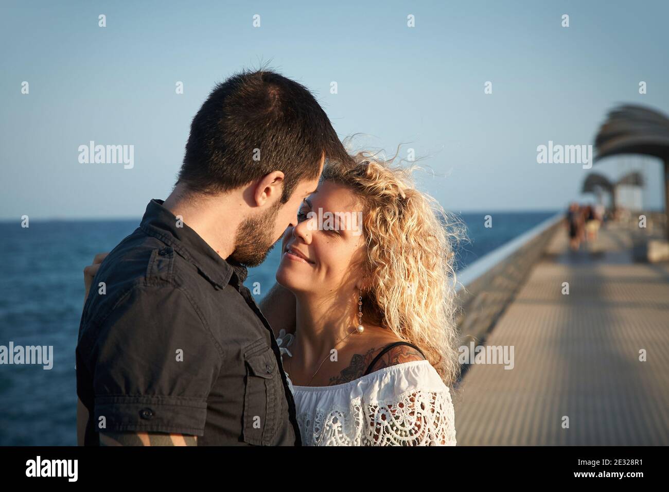 Young happy couple in love outdoors. loving man and woman walking on ...