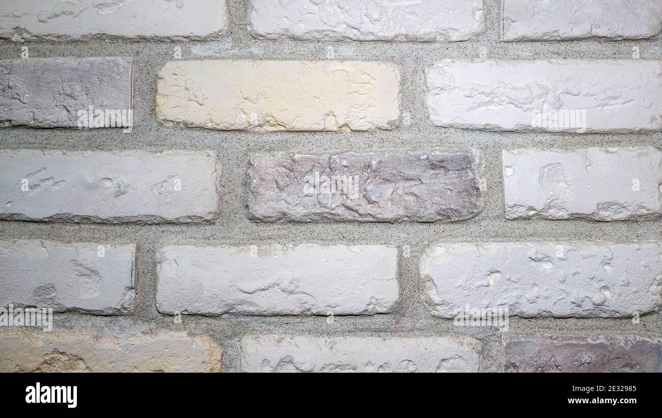 White brick wall, brick texture, background from white natural bricks. Stock Photo
