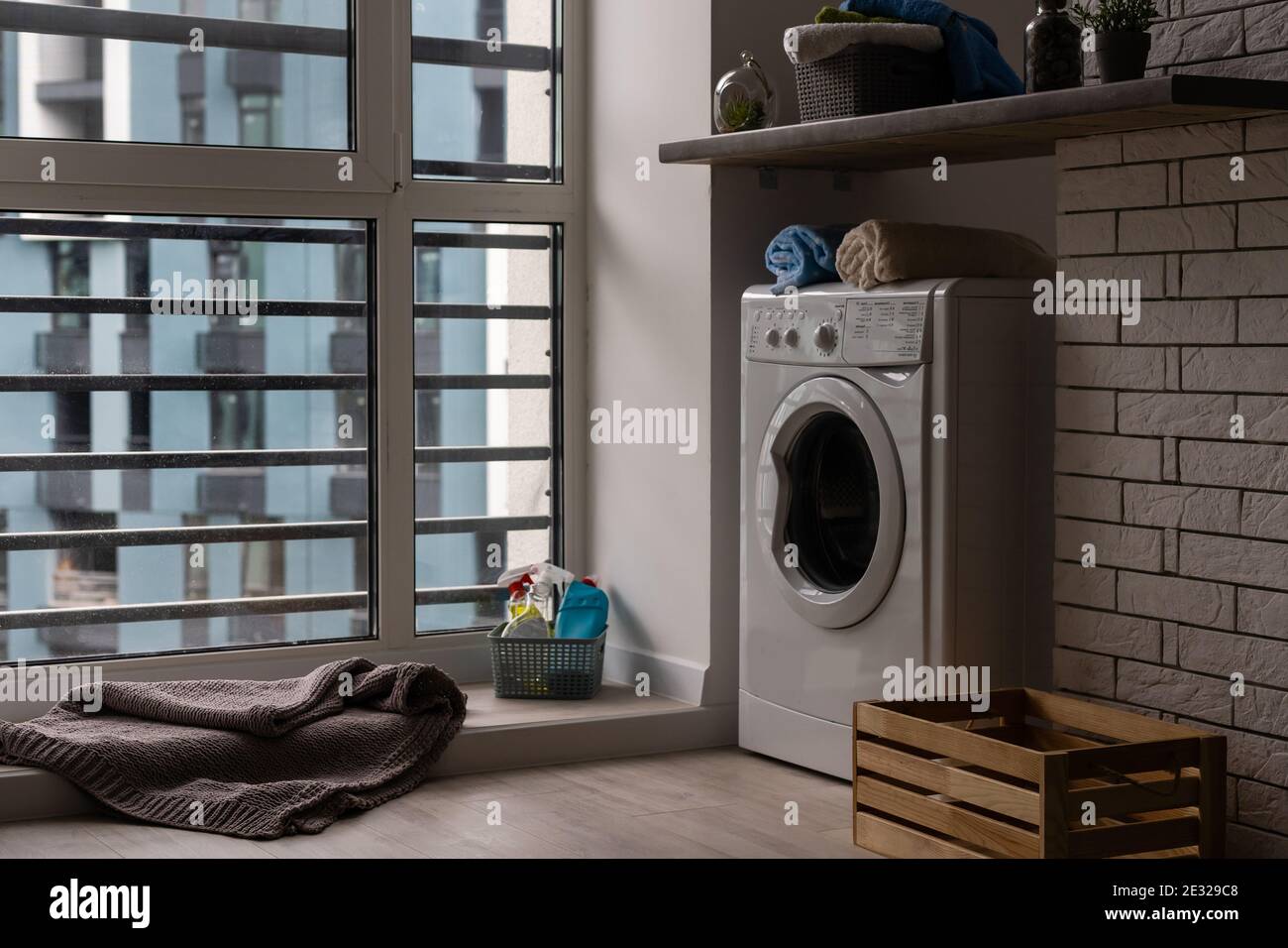 Picture of Contemporary luxury laundry in a brand new apartment in white Stock ...