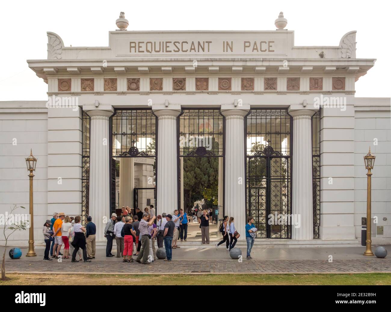 Visiting group outside entrance to Recoleta Cemetery Buenos Aires, Argentina Stock Photo