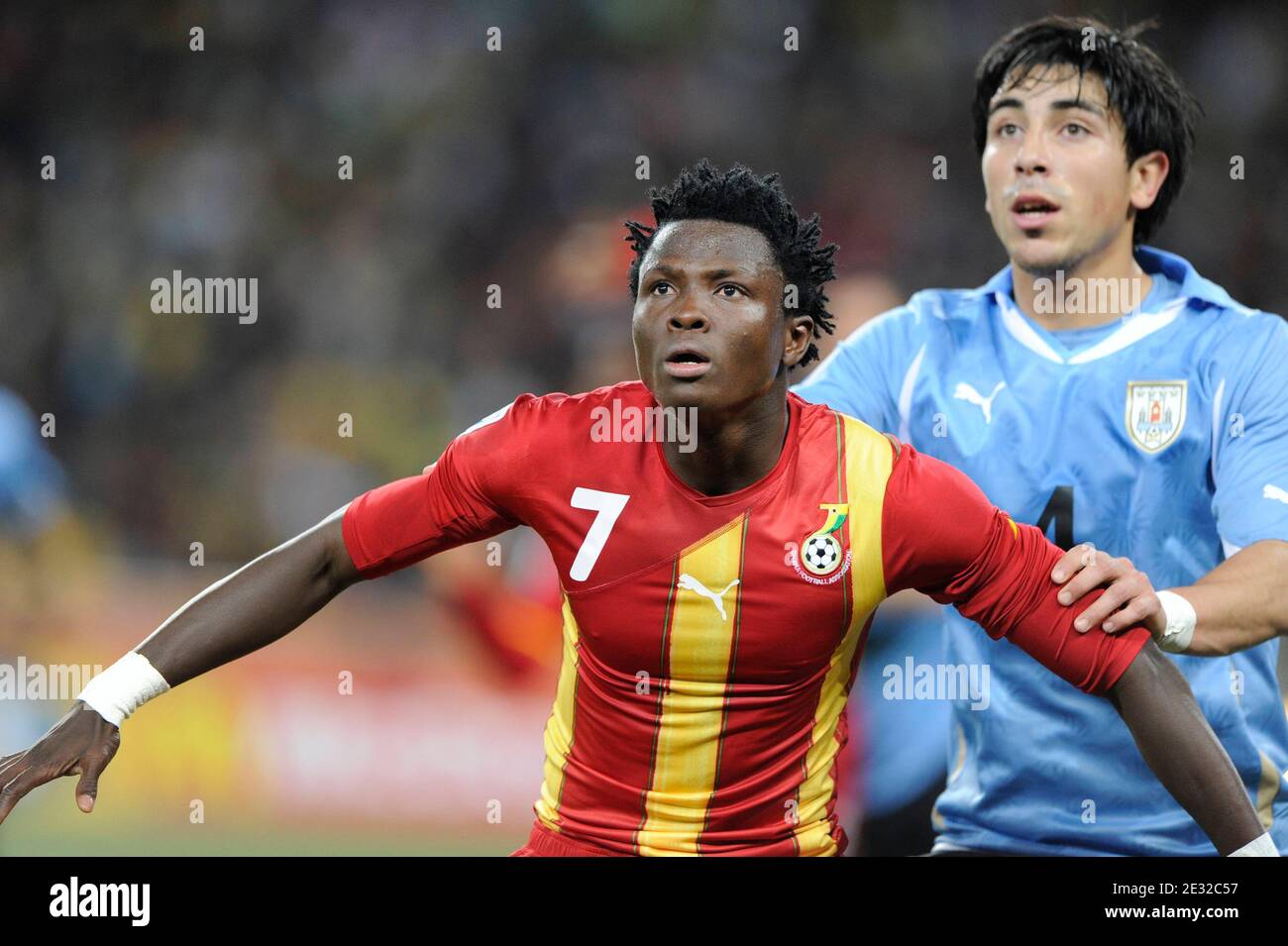 Ghana's Samuel Inkoom battles for the ball with Uruguay's Jorge Fucile during the 2010 FIFA World Cup South Africa, Quarter Final, Soccer match, Ghana vs Uruguay at Soccer City football stadium in Johannesburg, South Africa on July 2nd, 2010. Uruguay won 0-0 (5p to 4). Photo by Henri Szwarc/ABACAPRESS.COM Stock Photo