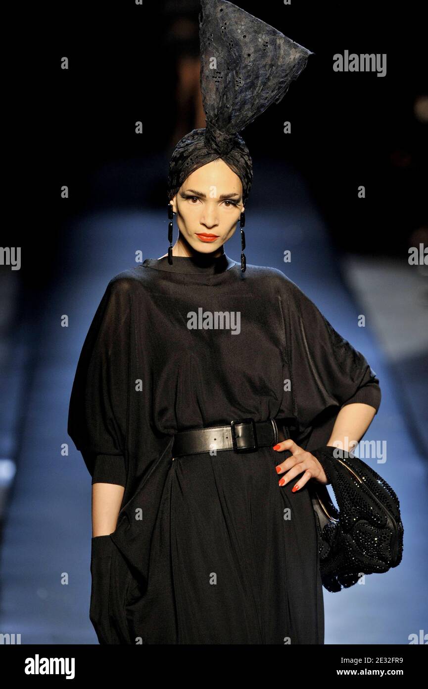 Former top model Farida Khelfa displays a creation of French designer Jean-Paul  Gaultier Haute Couture
