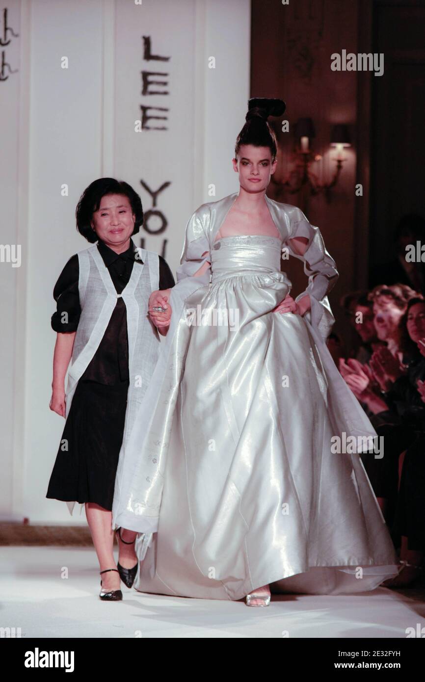 Korean designer Lee Young Hee on the runway with a model during the presentation of her new 'Hansan Mosi' collection at the Meurice Hotel in Paris, France on July 6, 2010. Photo by Cyril Chateau/ABACAPRESS.COM Stock Photo