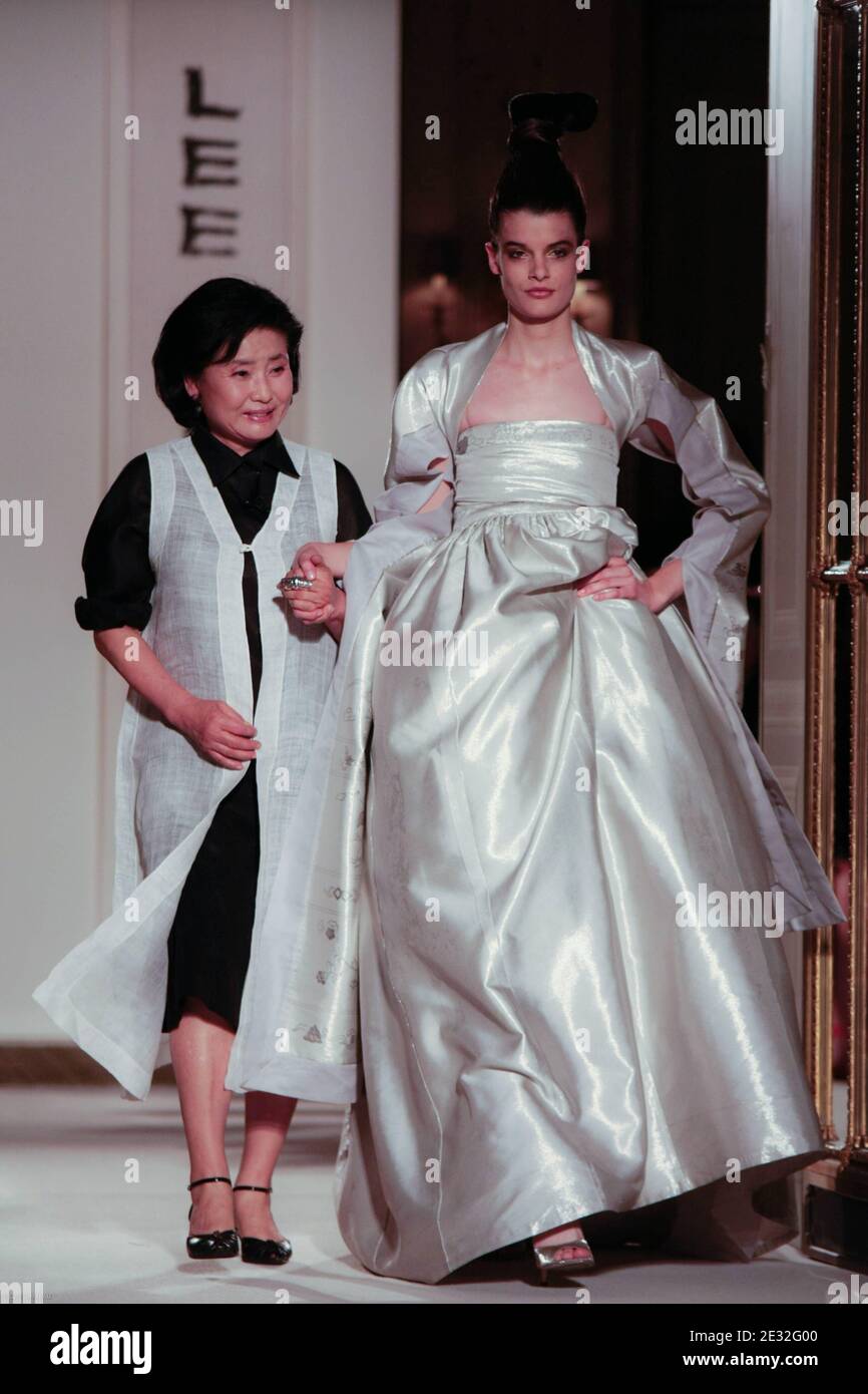 Korean designer Lee Young Hee on the runway with a model during the presentation of her new 'Hansan Mosi' collection at the Meurice Hotel in Paris, France on July 6, 2010. Photo by Cyril Chateau/ABACAPRESS.COM Stock Photo