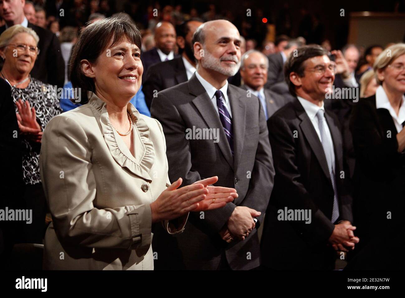 'FDIC Chair Sheila Bair (2nd L) and Federal Reserve Bank Chairman Ben Bernanke (C) look on after U.S. President Barack Obama signed the the financial reform bill into law during a ceremony at the Ronald Reagan Building and International Trade Center July 21, 2010 in Washington, DC. A sweeping expansion of federal financial regulation in the wake of the worst recession since the Great Depression, the bill will create a consumer protection agency, lay out a blueprint for disassembling financial entities considered ''too big to fail,'' and many other reforms. Photo by Chip Somodevilla/ABACAPRESS. Stock Photo