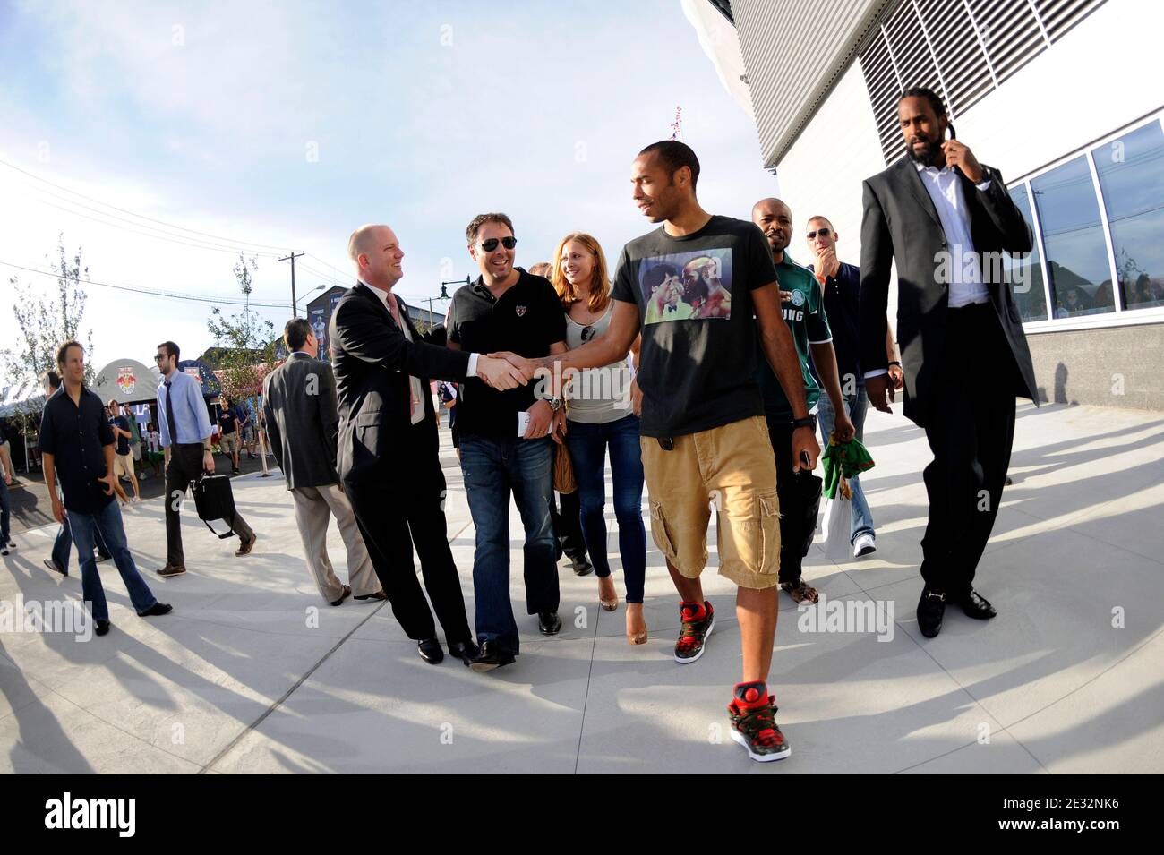 EXCLUSIVE - Thierry Henry with his girlfriend Andrea Rajacic and Ronny Turiaf arrive for the friendly New York Red Bulls vs Tottenham Hotspur match at Red Bull Arena.Tottenham won, 2-1 in Harrison, New Jersey. USA on July 22, 2010. Photo by Mehdi Taamallah/ABACAPRESS.COM Stock Photo