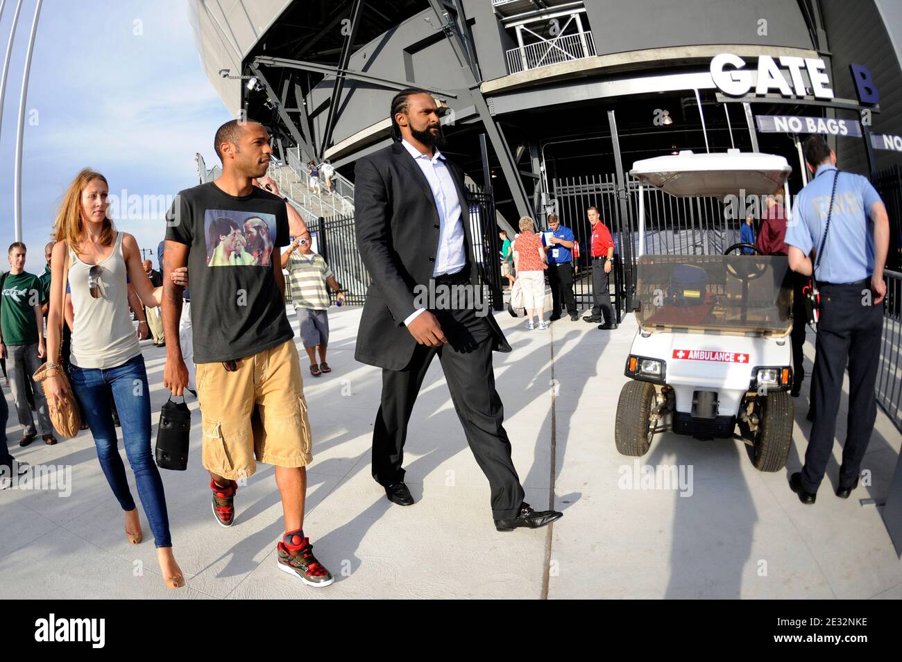 EXCLUSIVE - Thierry Henry with his girlfriend Andrea Rajacic and Ronny Turiaf arrive for the friendly New York Red Bulls vs Tottenham Hotspur match at Red Bull Arena.Tottenham won, 2-1 in Harrison, New Jersey. USA on July 22, 2010. Photo by Mehdi Taamallah/ABACAPRESS.COM Stock Photo