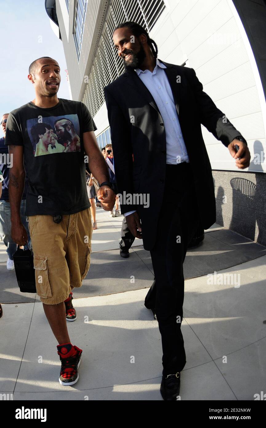 EXCLUSIVE - Thierry Henry with his girlfriend Andrea Rajacic and Ronny Turiaf arrive for the friendly New York Red Bulls vs Tottenham Hotspur match at Red Bull Arena.Tottenham won, 2-1 in Harrison, New Jersey. USA on July 22, 2010. Photo by Mehdi Taamallah/ABACAPRESS.COM Stock Photo