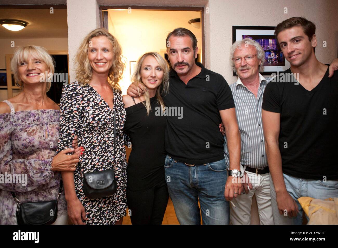 Audrey Lamy with family including sister Alexandra Lamy and Jean Dujardin  pose during Humoristic gala animated by Michel Boujenah during Festival of  Ramatuelle 2010 in Ramatuelle, France, on July 31, 2010. Photo