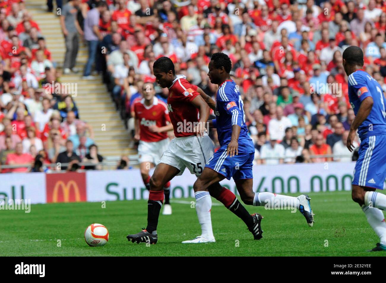 Chelsea's John Obi Mikel battles Manchester United's Antonio Valencia during the Community Shield 2010 Soccer match, Chelsea vs Manchester United at Wembley football stadium in London, UK, on August 8th, 2010. Manchester United won 3-1. Photo by Henri Szwarc/ABACAPRESS.COM Stock Photo