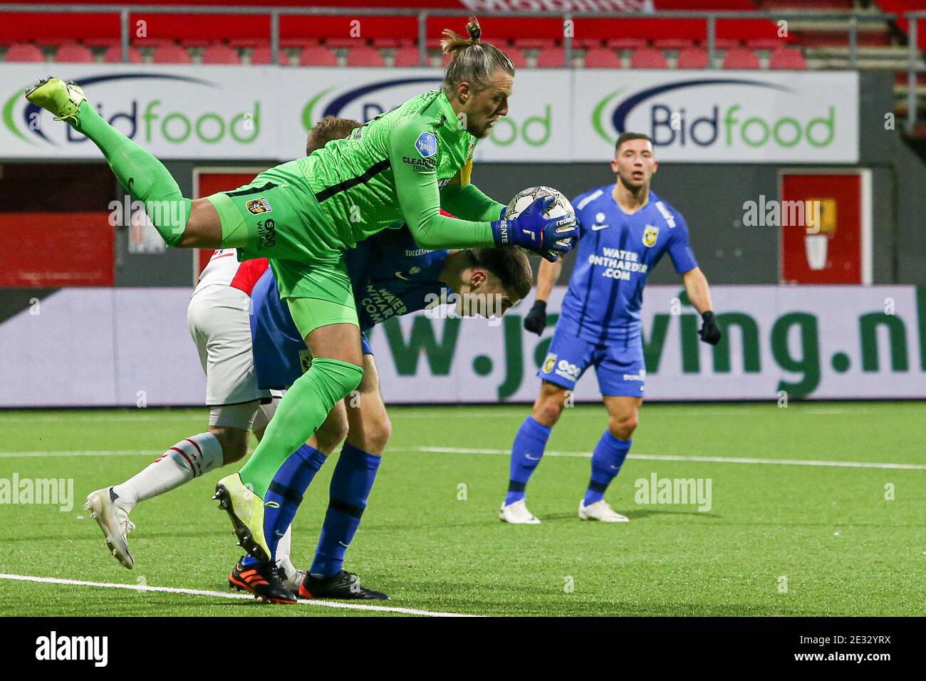 EMMEN, NETHERLANDS - JANUARY 16: (L-R): Goalkeeper Remko Pasveer of Vitesse, Jacob Rasmussen of Vitesse during the Dutch Eredivisie match between FC E Stock Photo