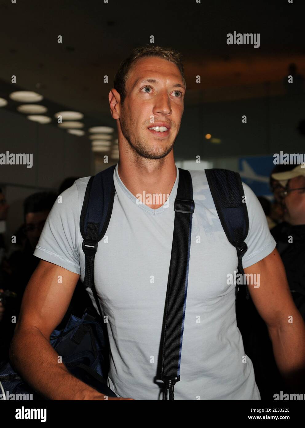 French swimmer Alain Bernard and National French team arriving to