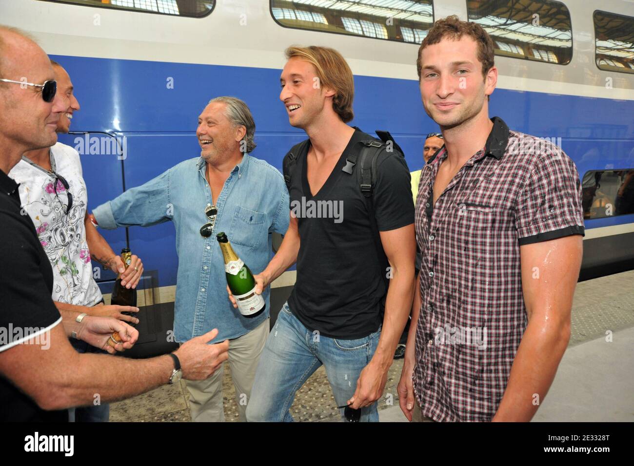 (From L to R) French swimmers and European medalists Fabien Gilot and William Meynard are welcomed by relatives at Marseille Saint-Charles train station in Marseille, France on August 17, 2010 as they arrive from the European swimming championships in Budapest. France won 23 medals including 8 gold, 8 silver and 7 bronze and ranked first, in front of Russia and Germany. Photo by Jeremy Charriau/ABACAPRESS.COM Stock Photo