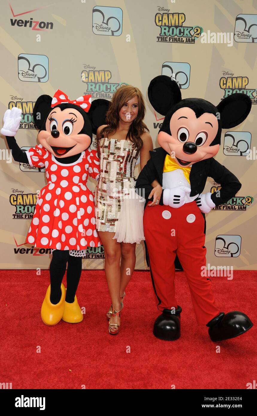 (L-R) Minnie Mouse, Demi Lovato and Mickey Mouse arriving for the Disney Channel World Premiere of 'Camp Rock 2: The Final Jam' held at the Alice Tully Hall in Lincoln Center, New York City, NY, USA on August 18, 2010. Photo by Graylock/ABACAPRESS.COM Stock Photo