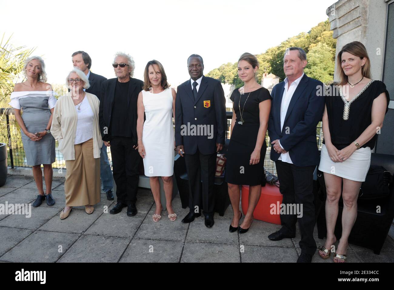 L to R) Members of the jury Dora Bouchoucha, Bruno Cras, Micheline Presle,  Luc Plamondon, Nathalie Baye (president), Michel Ouedraogo, Emilie  Dequenne, Nicolas Stell and Lea Frazer pose on August 25, 2010