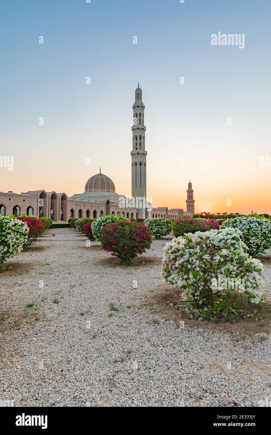 Middle East, Arabian Peninsula, Oman, Muscat. Sunset view of the Sultan Qaboos Grand Mosque in Bawshar,Muscat. Stock Photo