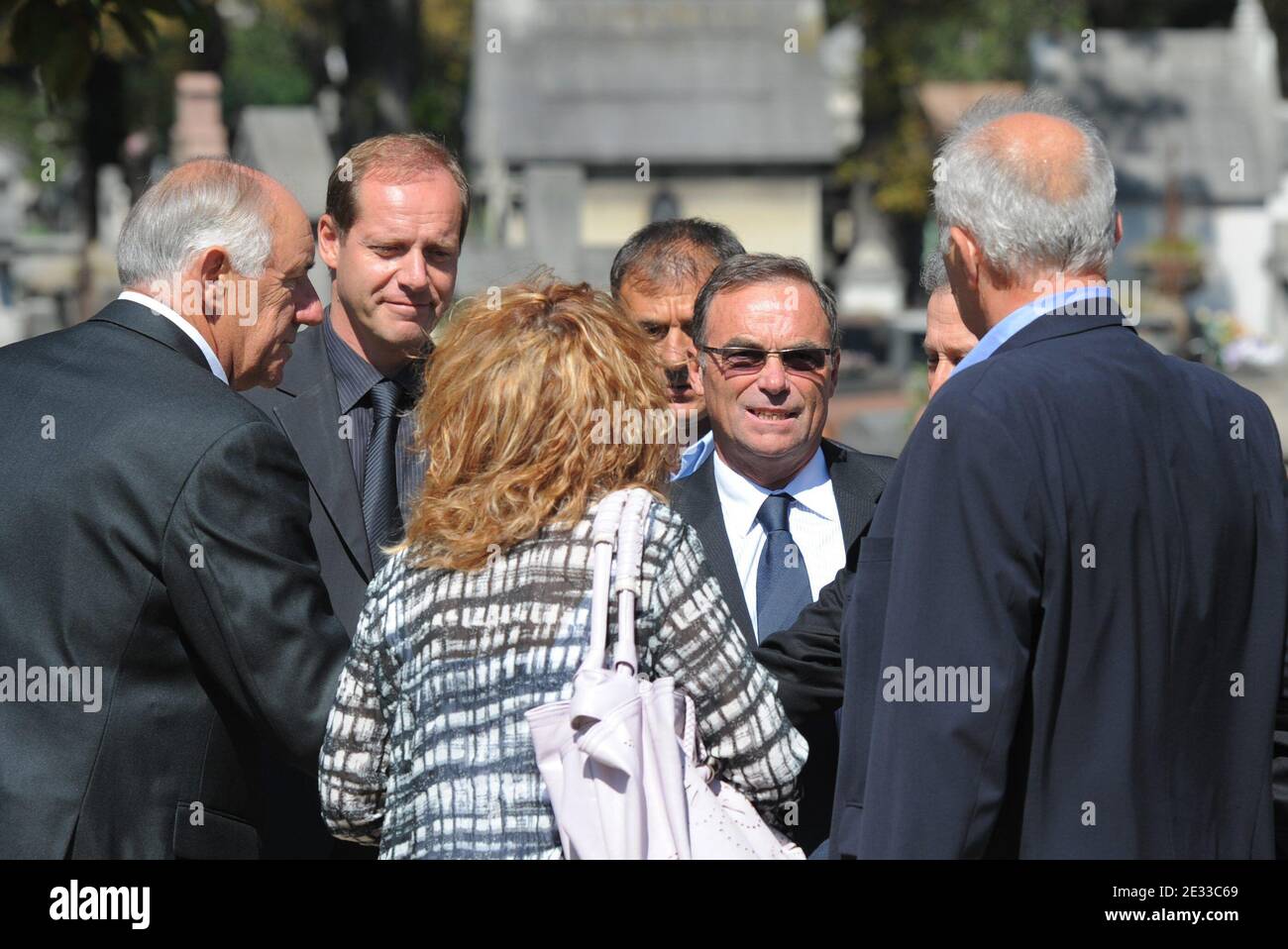 Tour de France director Christian Prudhomme (2ndL) arrives with French five-time tour de France winner, Bernard Hinault (C) to attend the funeral ceremony for French cycling champion Laurent Fignon at the Pere Lachaise crematorium in Paris, France on September 3, 2010. The former two-time Tour de France winner, aged 50, passed away in the Pitie-Salpetriere hospital in Paris on August 31, following a battle with cancer. Photo by Martin Bureau/Pool/ABACAPRESS.COM Stock Photo