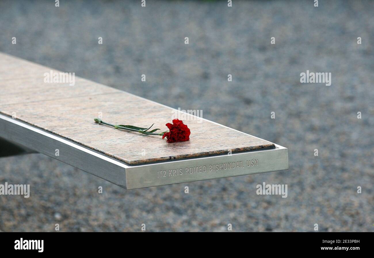 A carnation is placed on the bench to remember Kris Romeo Bishundat, a victim at the 9/11 Pentagon attack, prior to an event to mark the anniversary of the 9/11 terrorist attacks at the Pentagon Memorial September 11, 2010 in Arlington, VA, USA. U.S. President Obama will deliver remark and lay a wreath during the event on the ninth anniversary of the attack. Pool Photo by Alex Wong/ABACAPRESS.COM Stock Photo