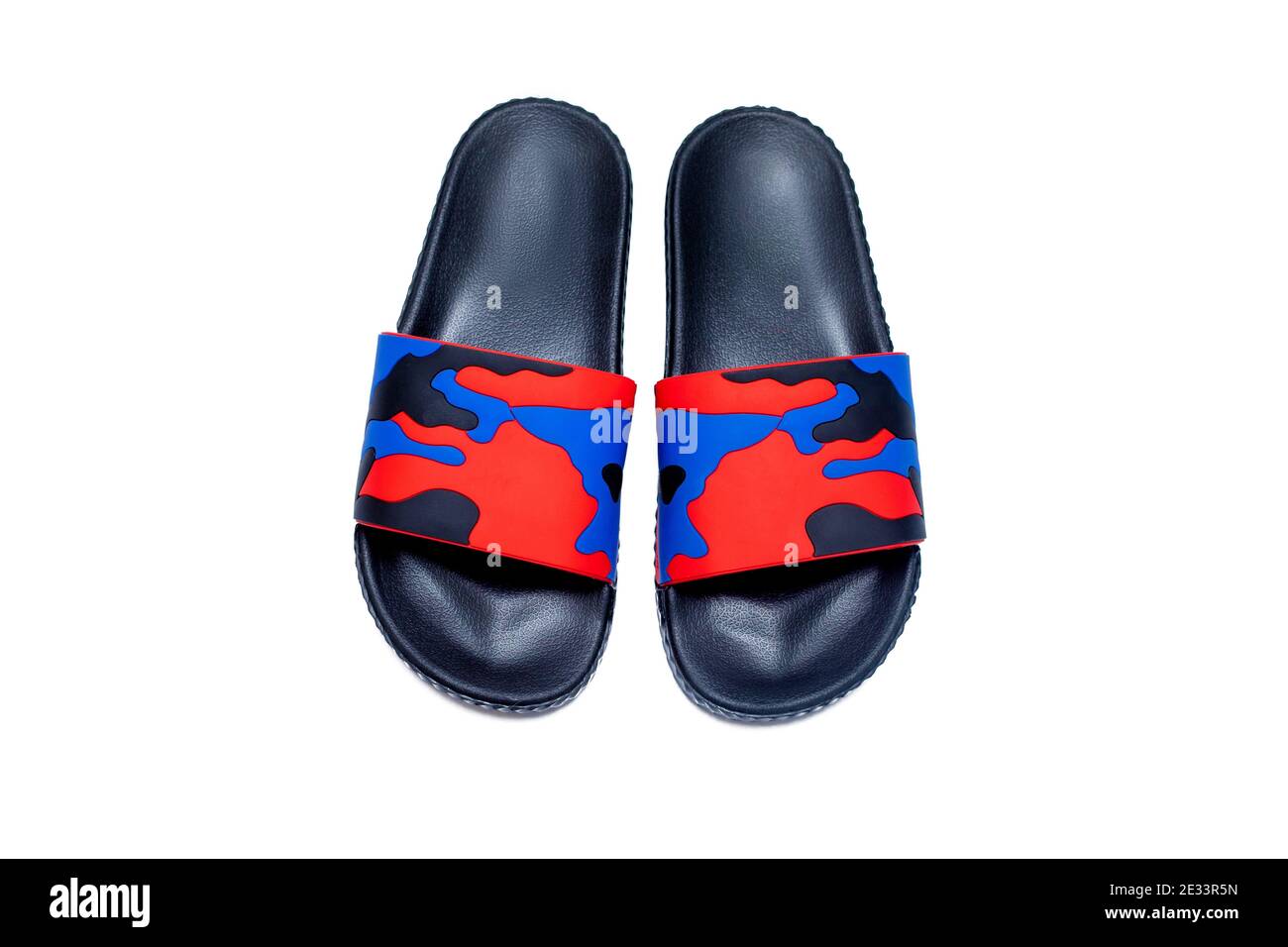 trendy slide sandal red blue black military slipper isolated on white background Stock Photo