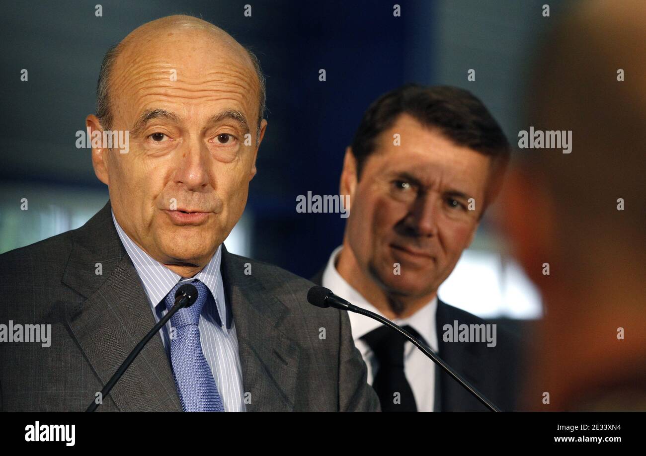 Christian Estrosi, Ministre de L'industrie et Alain Juppe, ancien Premier Ministre et maire de Bordeaux visite l'entreprise EADS, sous-traitance aeronautique À Salaunes et decouvre le salon international des dromes civils et militaires À Merignac, Pres de Bordeaux le 16 septembre 2010. Photo Patrick Bernard/ABACAPRESS.COM Stock Photo