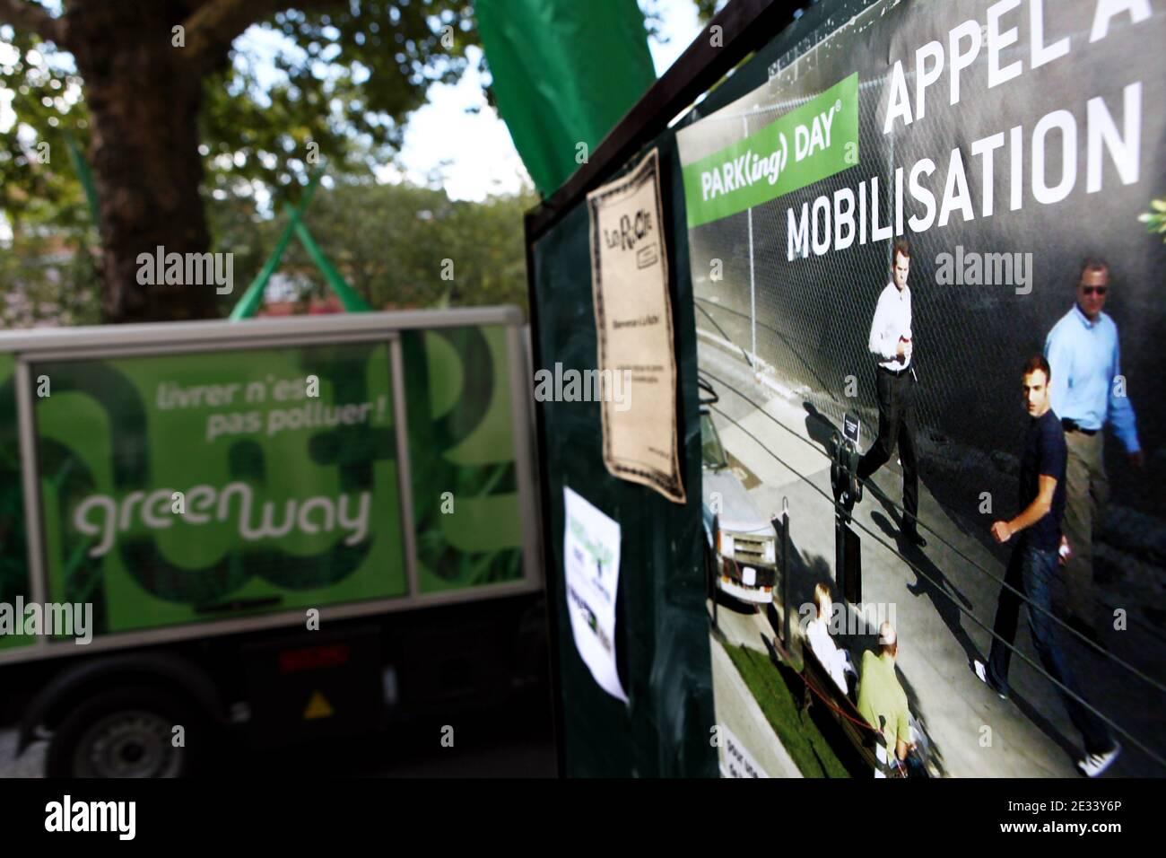 The magazine for sustainable development 'Terra Eco' installed its desks on the streets along the St. Martin canal to mark PARK(ing) Day, in Paris, France on September 17, 2010. PARK(ing) Day is an annual, worldwide event that inspires city dwellers everywhere to transform metered parking spots into temporary parks for the public good. Photo by Stephane Lemouton/ABACAPRESS.COM Stock Photo