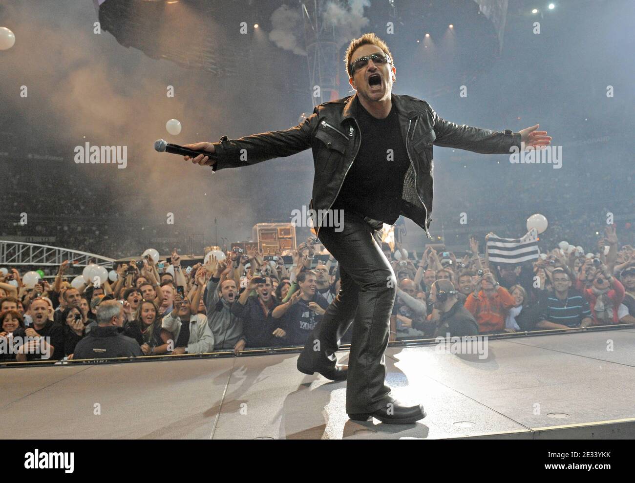 Bono (Paul Hewson) singer of the Irish rock band U2, performs on stage with guitarist The Edge (David Evans), bass player Adam Clayton and Larry Mullen Junior on drums at the Stade de France, in Saint-Denis, near Paris, France, on September 18, 2010. The band is on tour in Europe with their '360 Degrees'-tour. Photo by Christophe Guibbaud/ABACAPRESS.COM Stock Photo