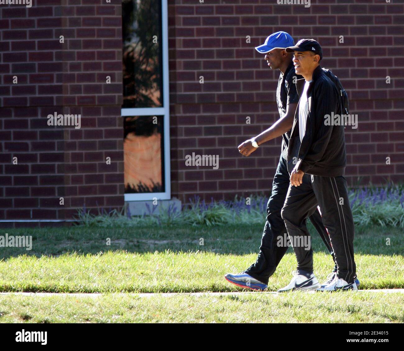 President Barack Obama walks with his personal aide, Reggie Love, as the two arrive at Fort Leslie J. McNair's athletic facility for a morning game of basketball in Washington, DC, USA on September 18, 2010. Photo by Martin H. Simon/ABACAPRESS.COM (Pictured: Barack Obama, Reggie Love) Stock Photo