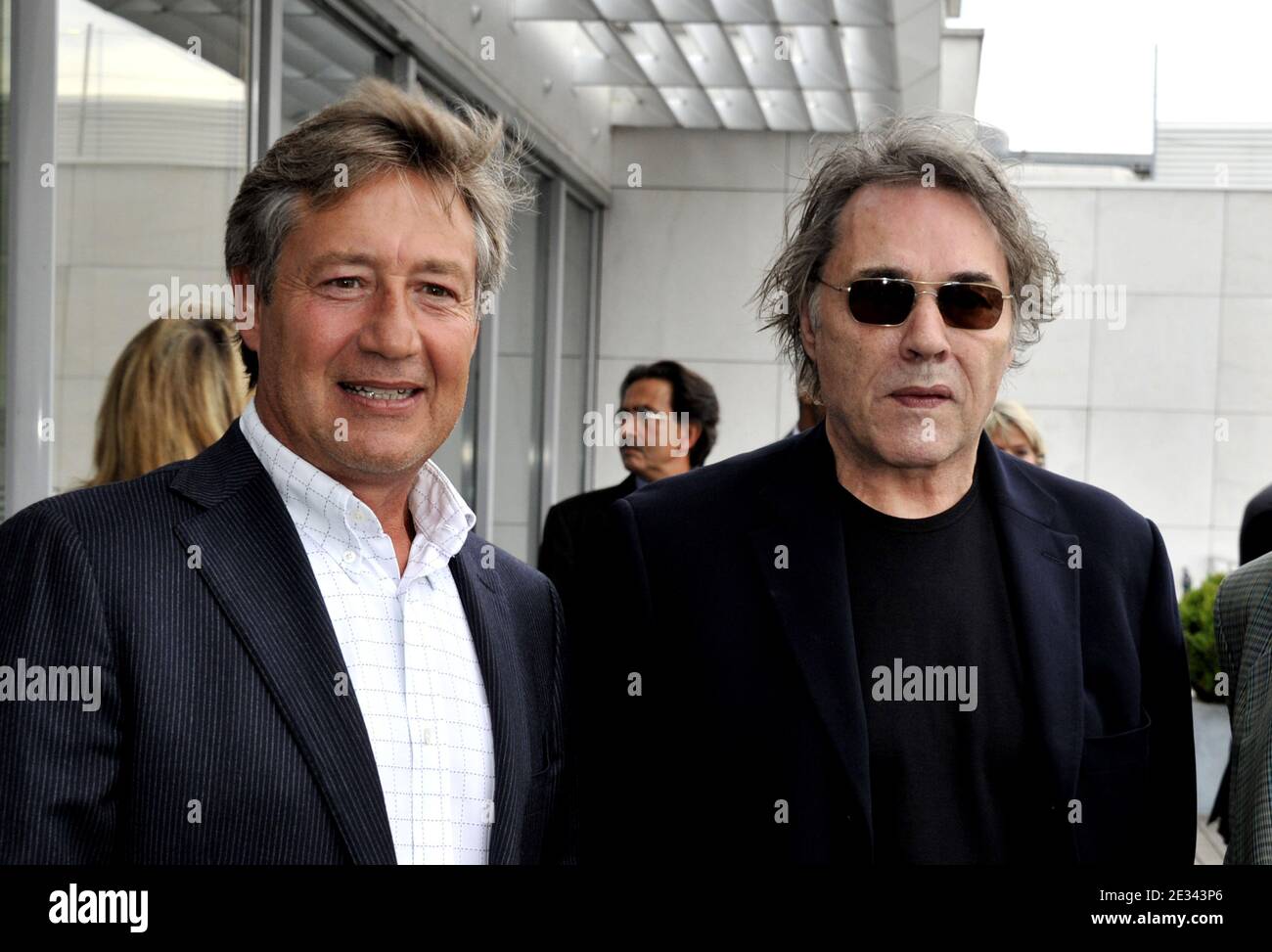 EXCLUSIVE. Patrick Sabatier (L) and Yves Simon attend a ceremony to award Laurent Boyer with the order of 'Chevalier dans l'Ordre National du Merite' by Alain-Dominique Perrin, at M6's TV channel studios, in Neuilly, France, on September 23, 2010. Photo by christophe Guibbaud/ABACAPRESS.COM Stock Photo