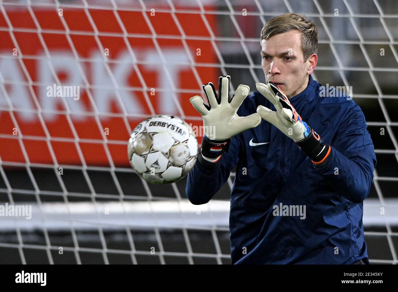 ALKMAAR, NETHERLANDS - JANUARY 16: (L-R): Goalkeeper Marco Bizot of AZ during warm up prior to match start during the Dutch Eredivisie match between A Stock Photo