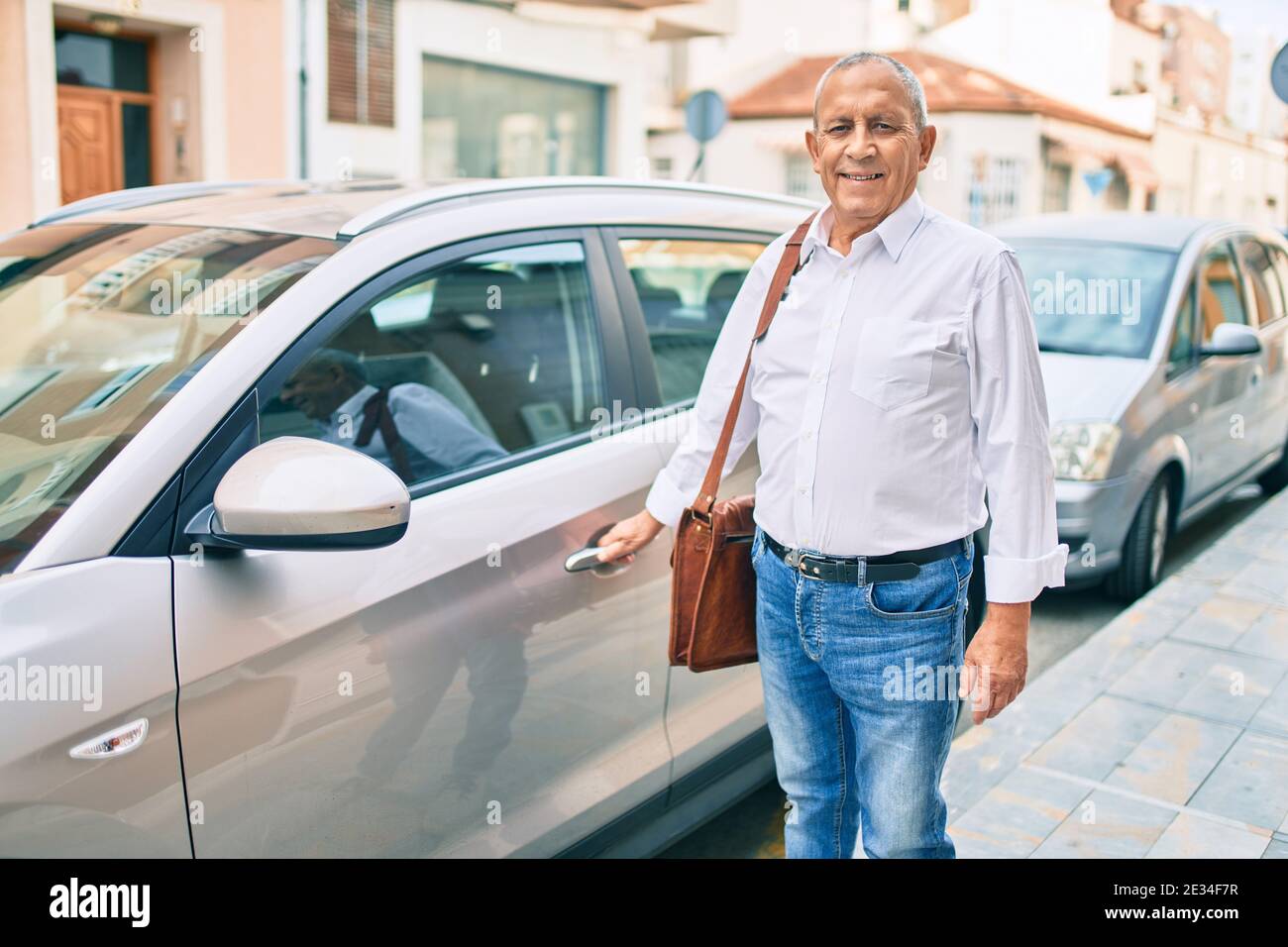 Portrait happy retired man opening hi-res stock photography and images ...