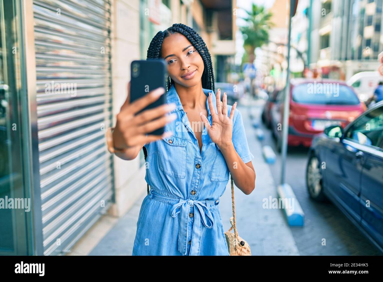 Young african american woman smiling happy doing video call using ...