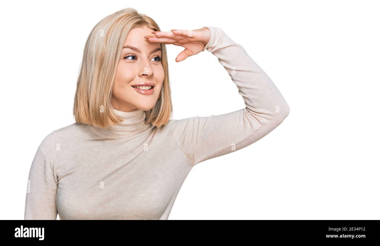 Young blonde woman wearing casual clothes very happy and smiling