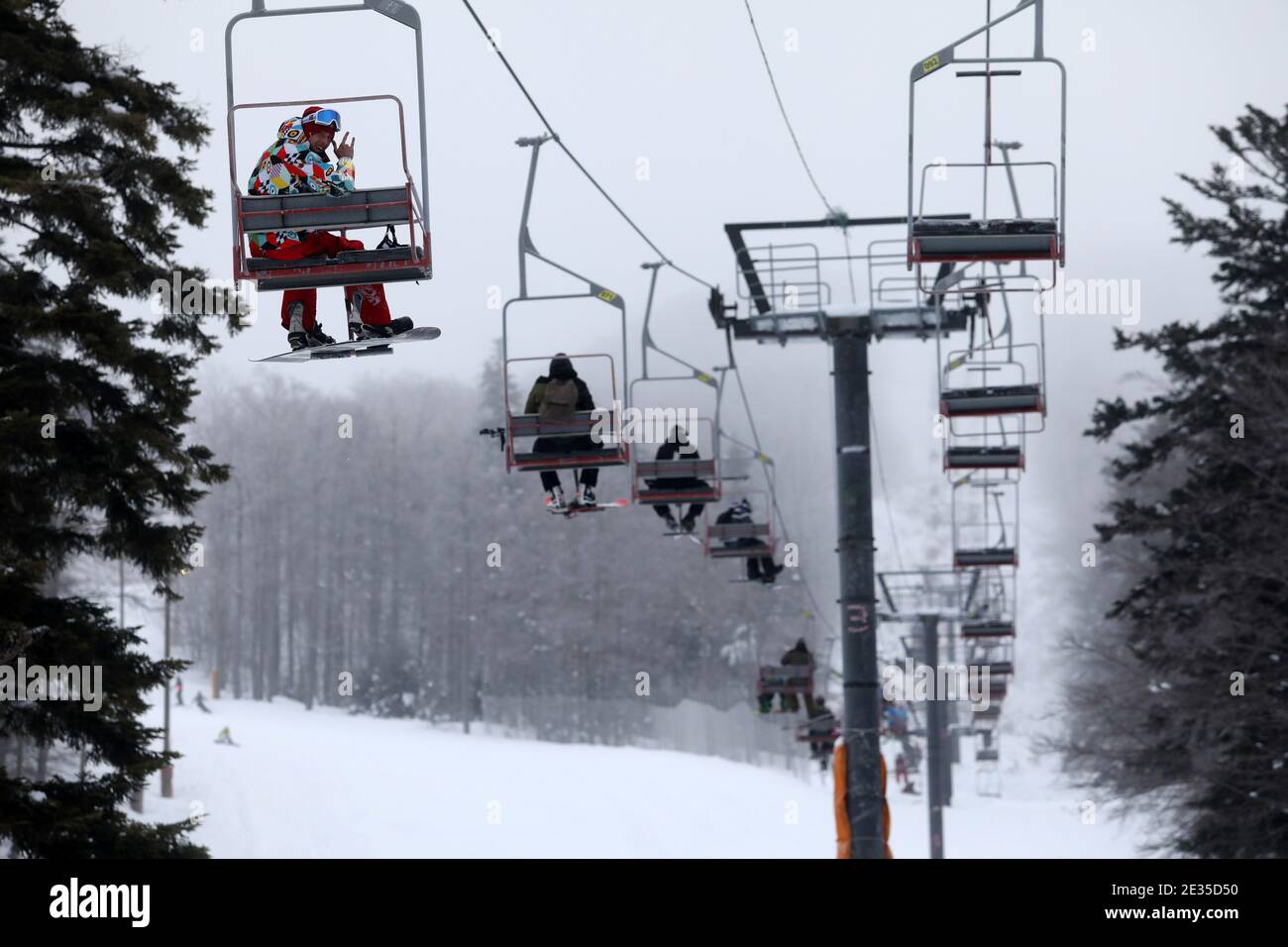 (210117) -- RIJEKA, Jan. 17, 2021 (Xinhua) -- Skiers use ski lifts at Platak ski resort near Rijeka, Croatia, Jan. 16, 2021. (Goran Kovacic/Pixsell via Xinhua) Stock Photo