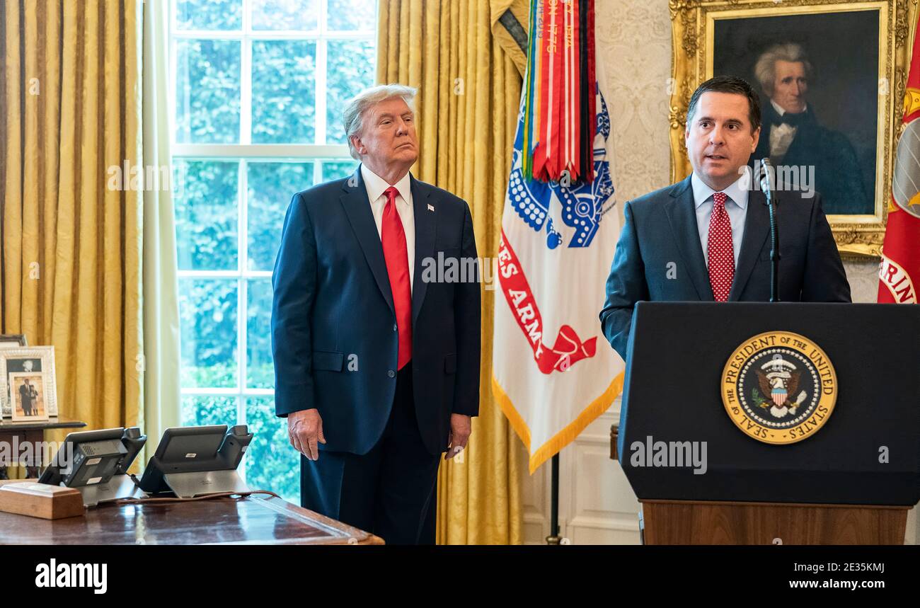 President Donald J. Trump awards Rep. Devin Nunes, R-Calif., Monday, Jan. 4, 2021, the Medal of Freedom to Nunes in the Oval Office of the White House. Stock Photo