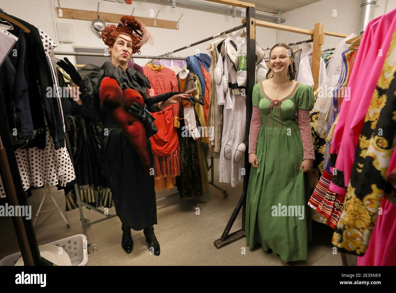 Rostock, Germany. 15th Jan, 2021. Ulrich K. Müller (l-r), actor, in the  costume of the Queen of Hearts from "Alice in Wonderland", and Klara Eham,  actress, in a dress from the play "