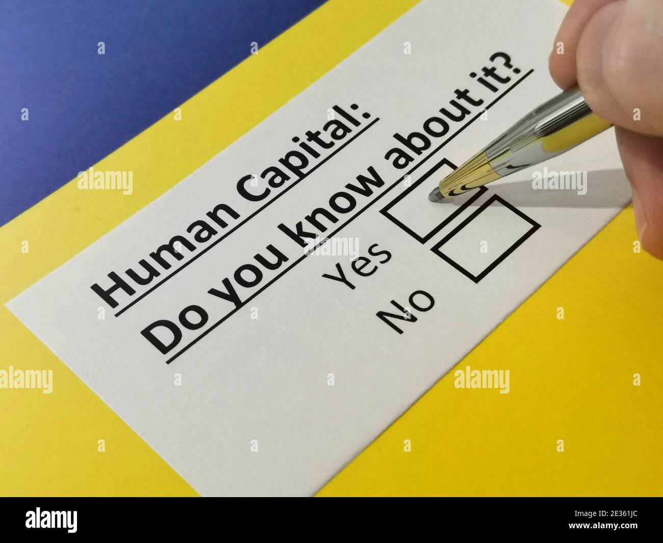 One person is answering question about human capital Stock Photo