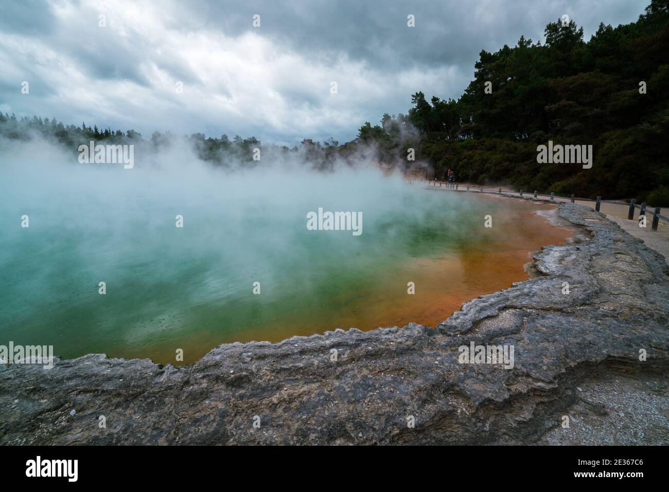Sunrise at Champagne Pool in Wai-O-Tapu thermal wonderland in Rotorua, New Zealand. Rotorua is known for geothermal activity, geysers and hot mud pool Stock Photo