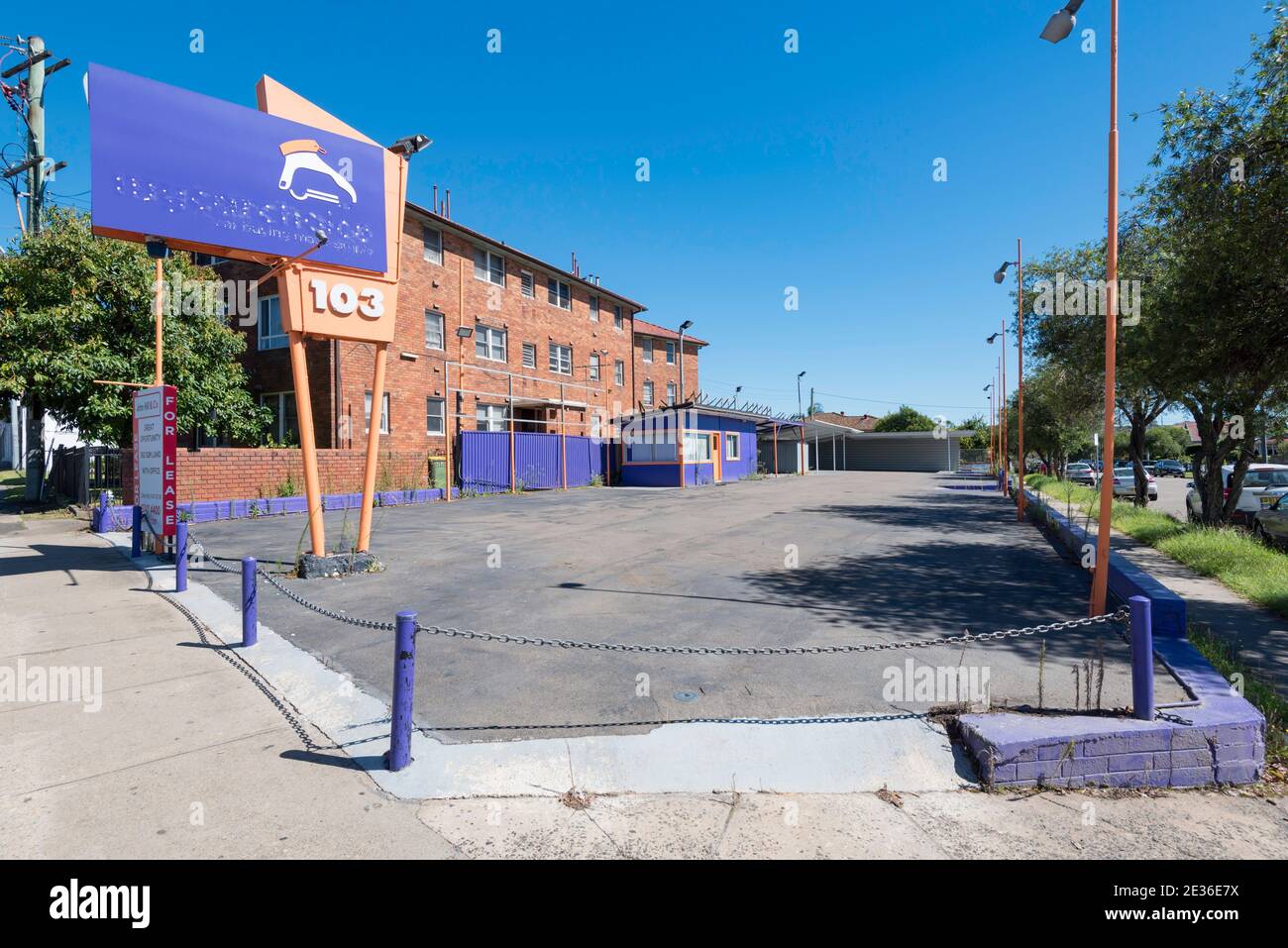 A vacant car lot at a former used car dealership on Parramatta Road in