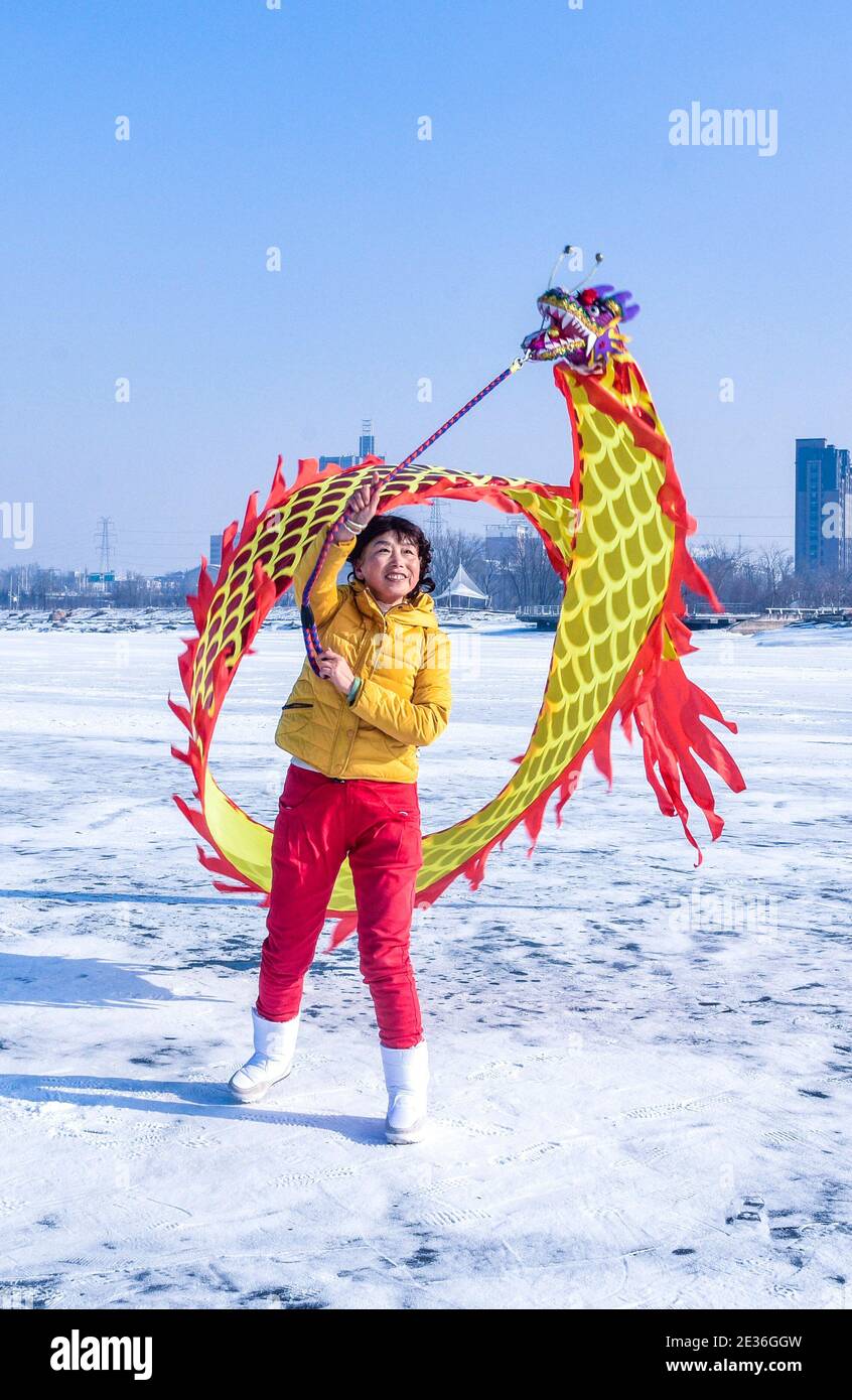 Colorful silk dance enthusiasts exercise outdoors in Changchun city, northeast China's Jilin Province, 12 January 2021. The national movement of color Stock Photo