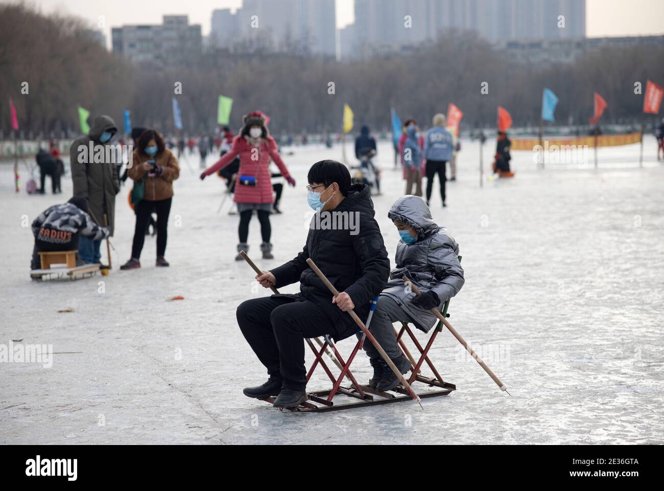 Citizens come to the park to skate and enjoy the joy brought by sports after skating rinks reopen in Shenyang city, northeast China's Liaoning provinc Stock Photo