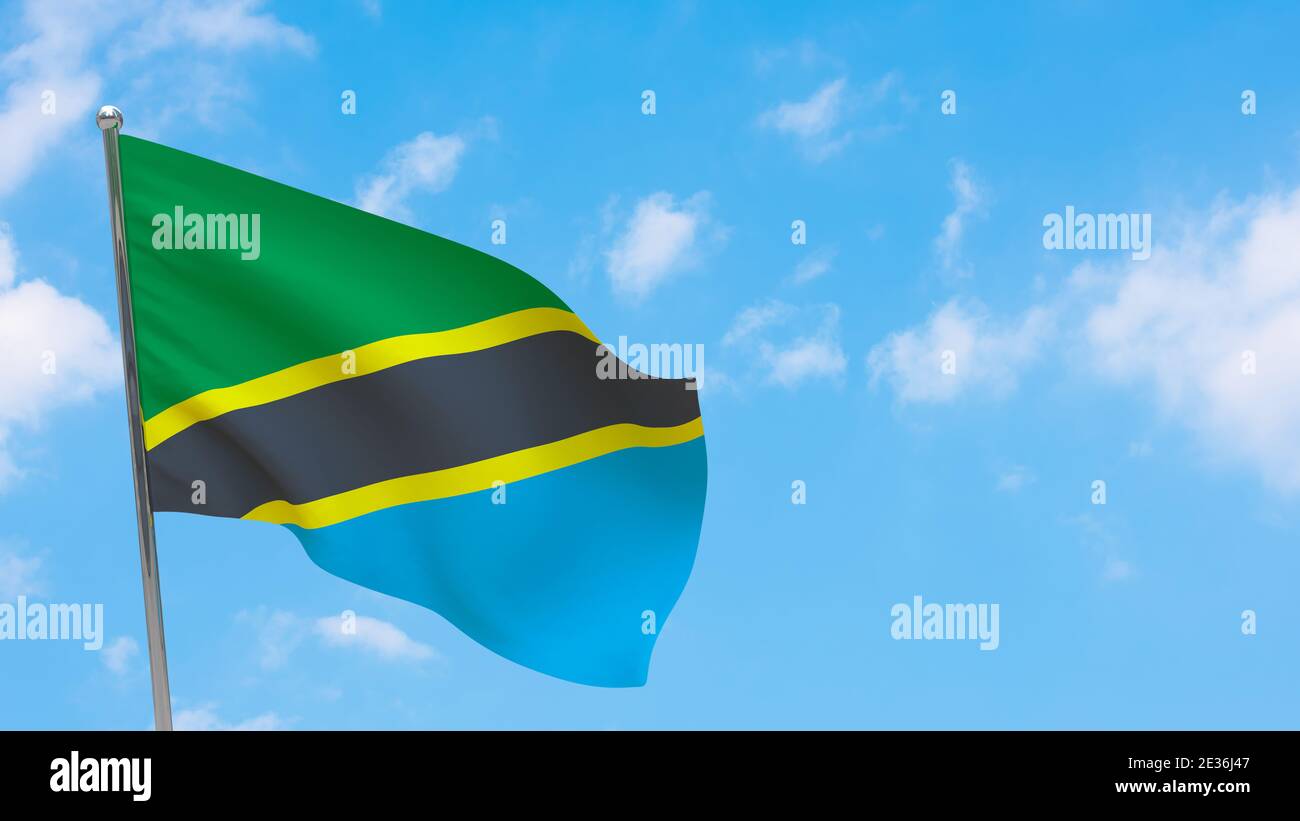 Tanzania flag on pole. Blue sky. National flag of Tanzania Stock Photo ...