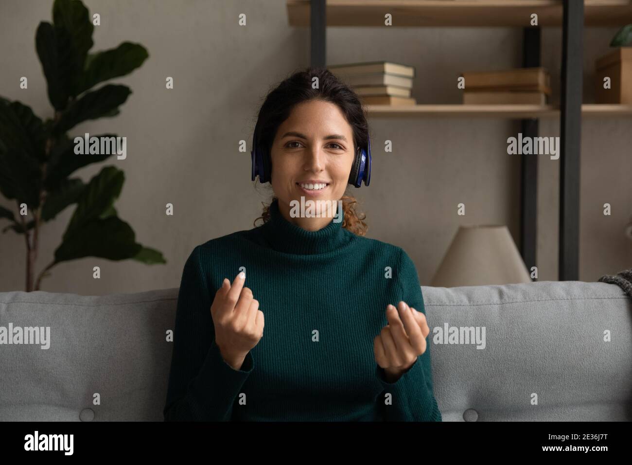 Portrait of woman in headphones talk on video call Stock Photo - Alamy