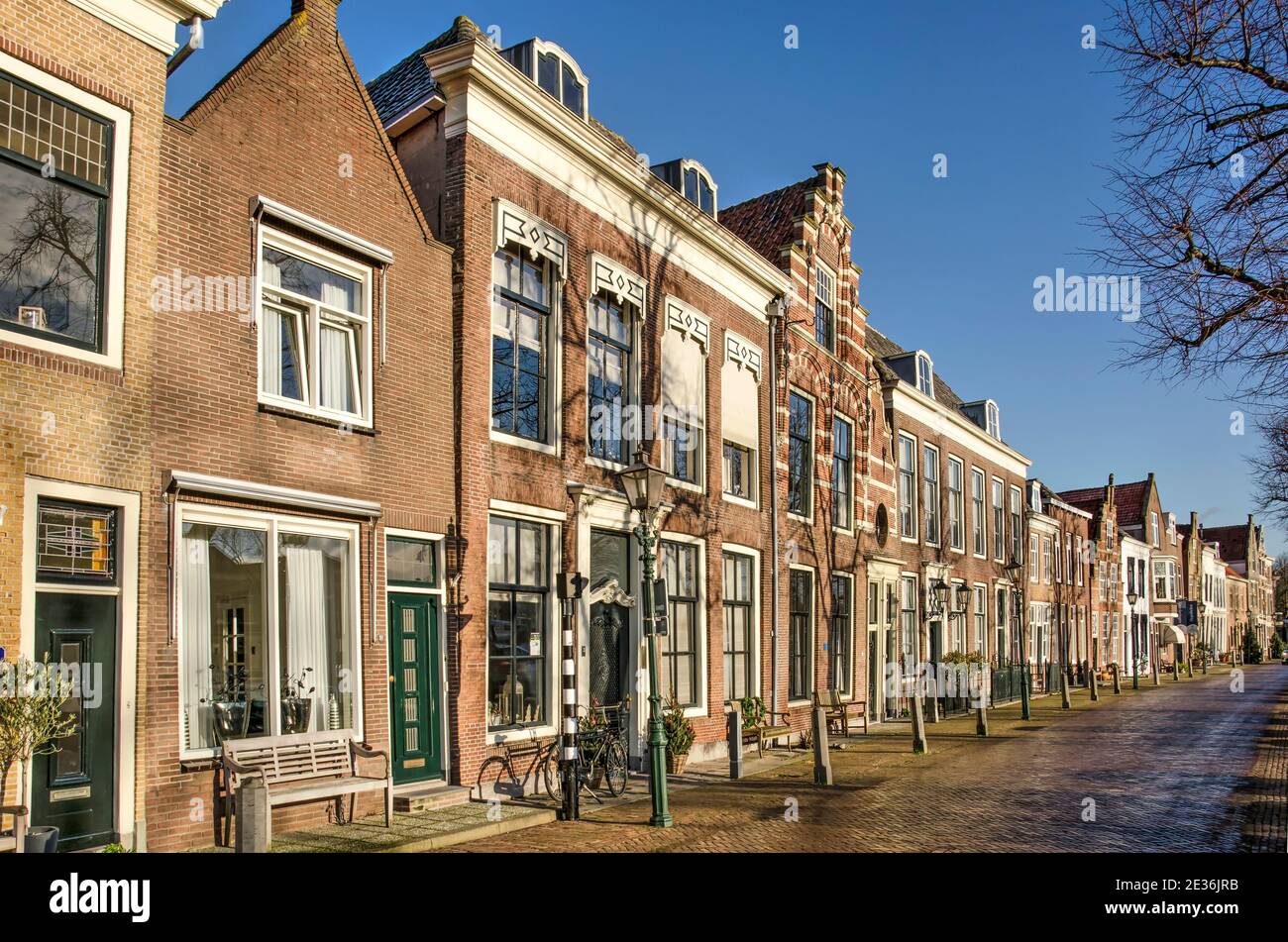 Brielle, The Netherlands, January 9, 2021 historic two storey canal houses on Maarland on a