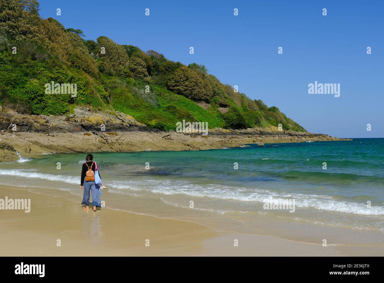 Woman on beach at Carbis Bay close t St Ives in Cornwall, UK. Stock Photo